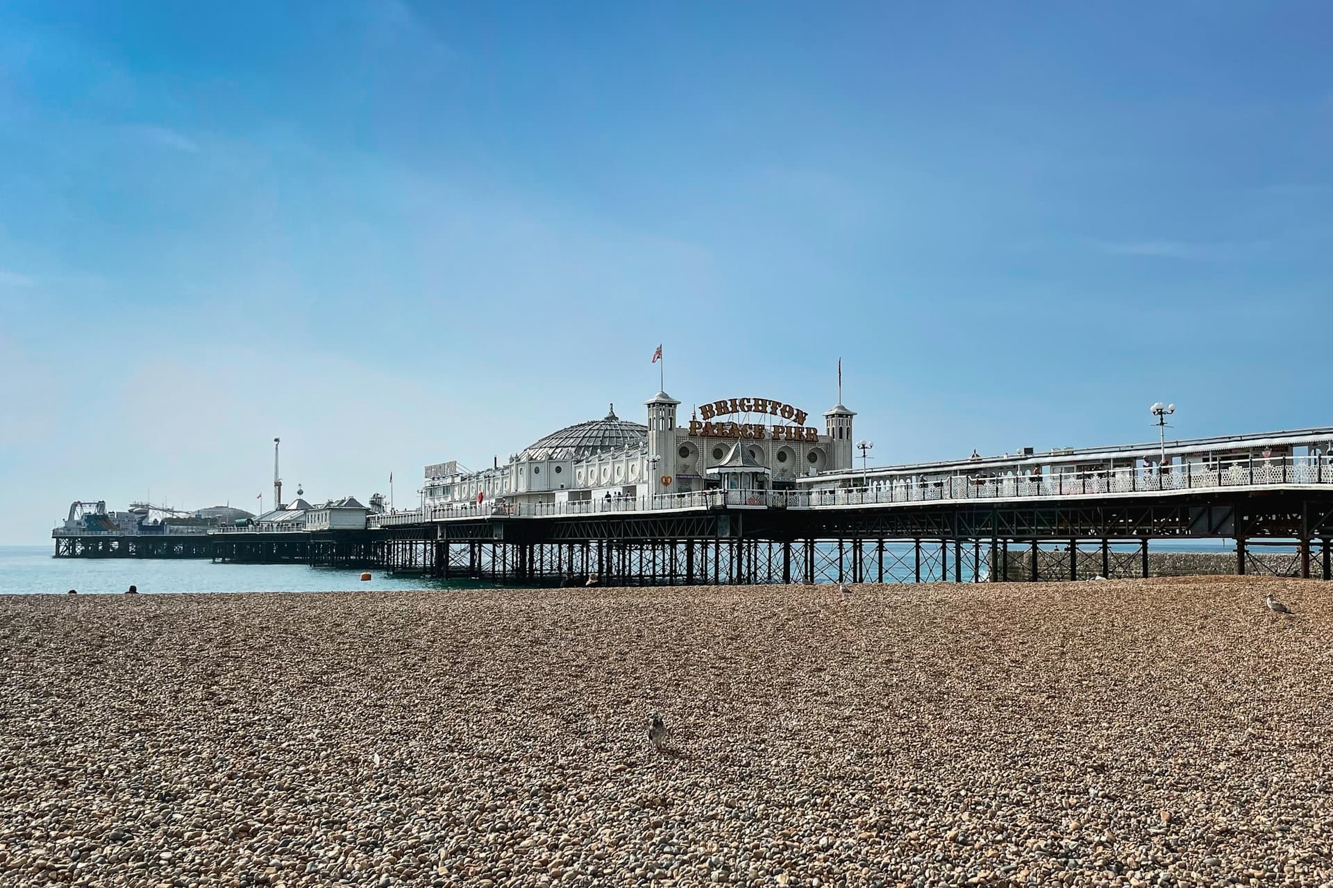Brighton Palace Pier from the pebble beach.