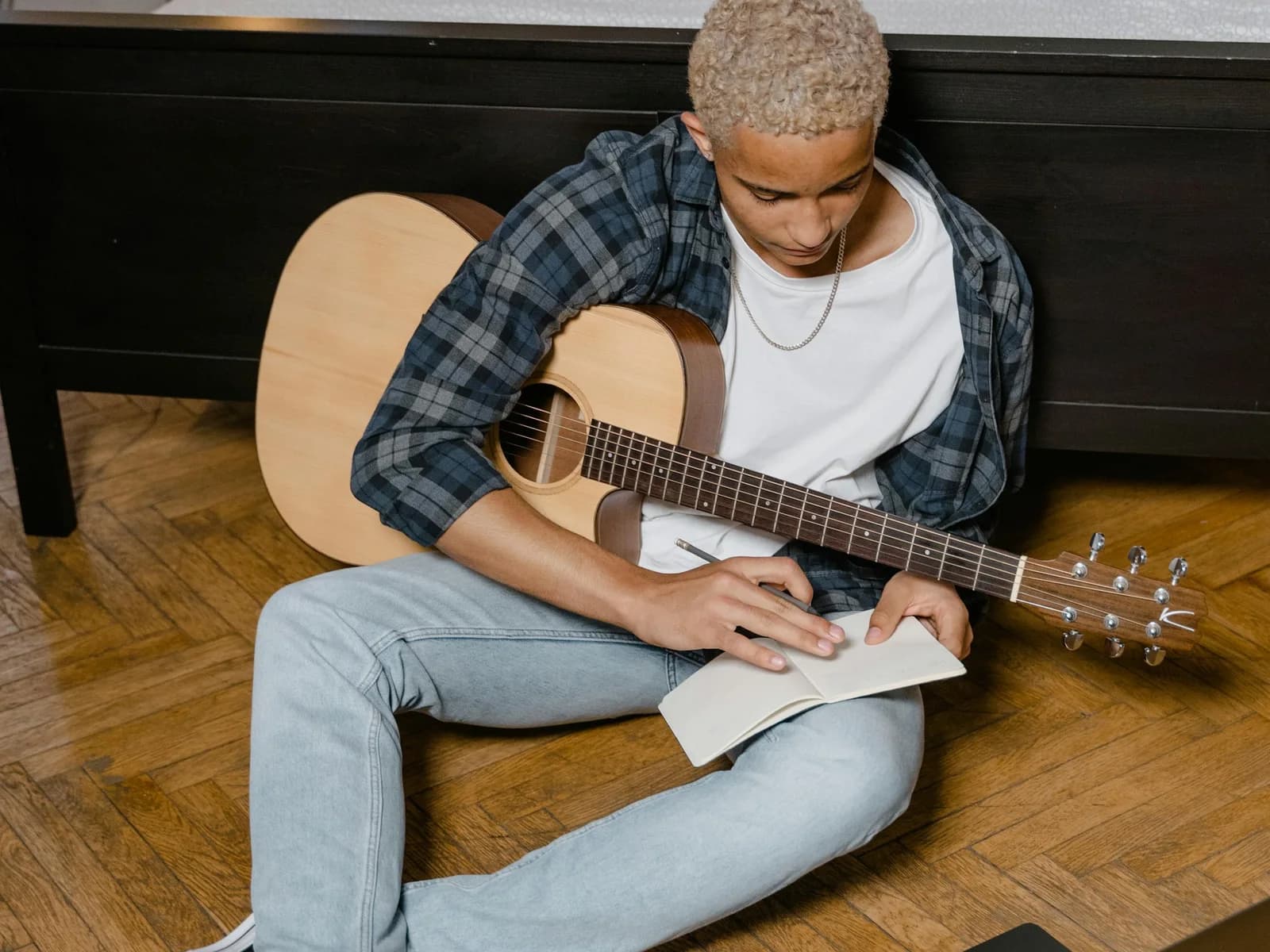A student preparing a question before messaging or booking a music teacher.